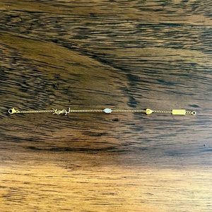 Size small YSL bracelet with heart charm